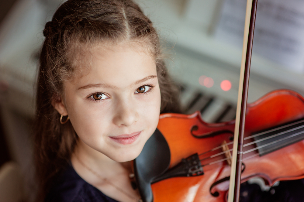 Занятия музыкой улучшают память и внимательность детей